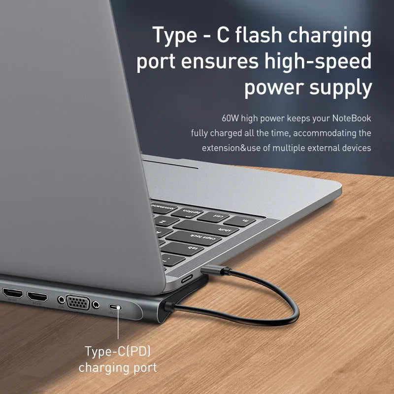 Grey ten-port laptop docking station with integrated cooling bracket showing HDMI, VGA, USB, and Ethernet ports