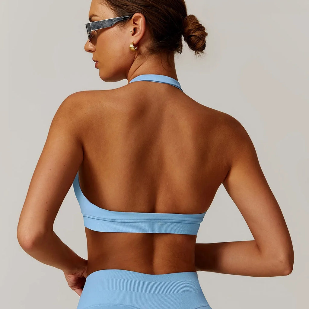 Women's halter style yoga sports bra in nylon with removable chest pads