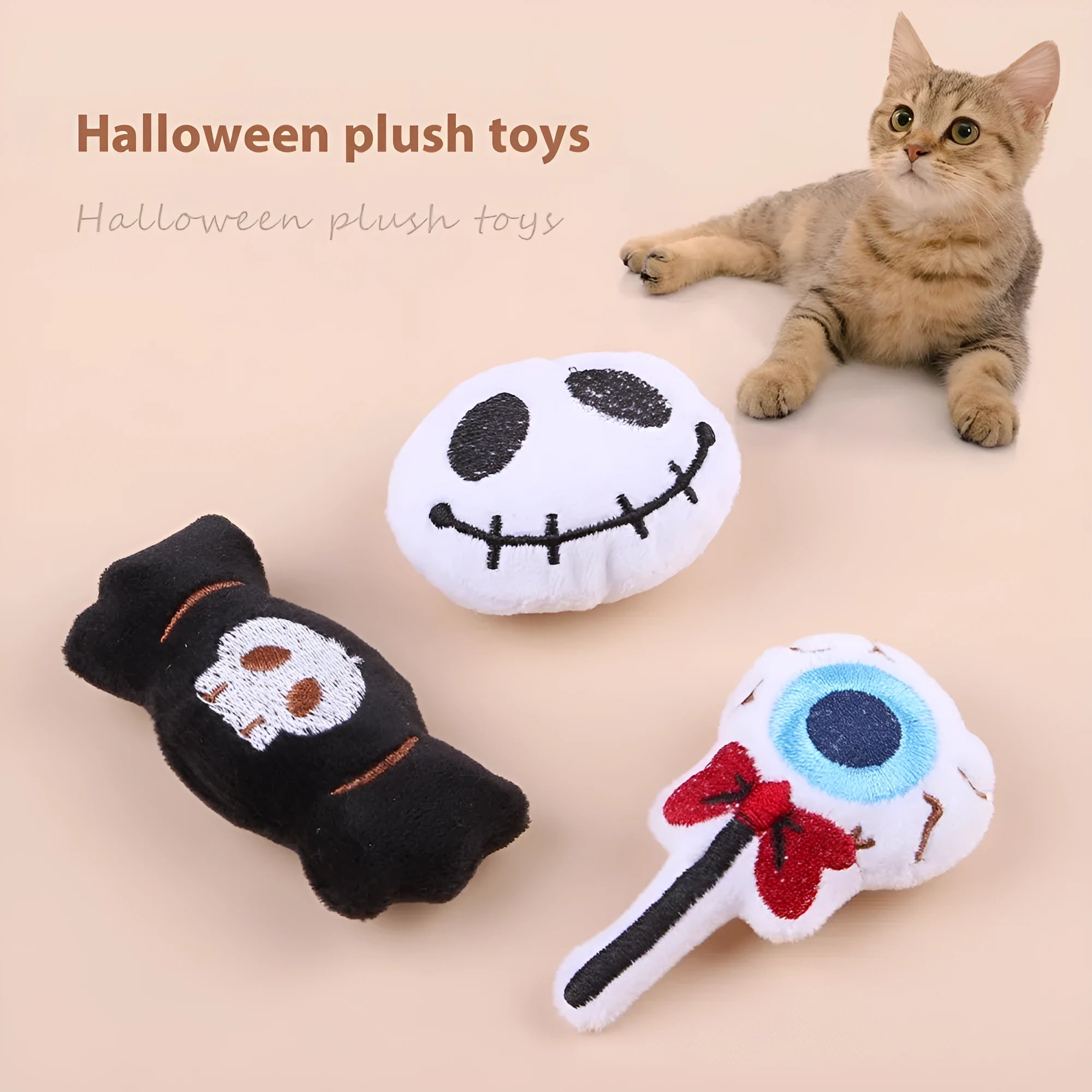Small plush cat teaser toy with candy and skull designs in eyes or candy colours
