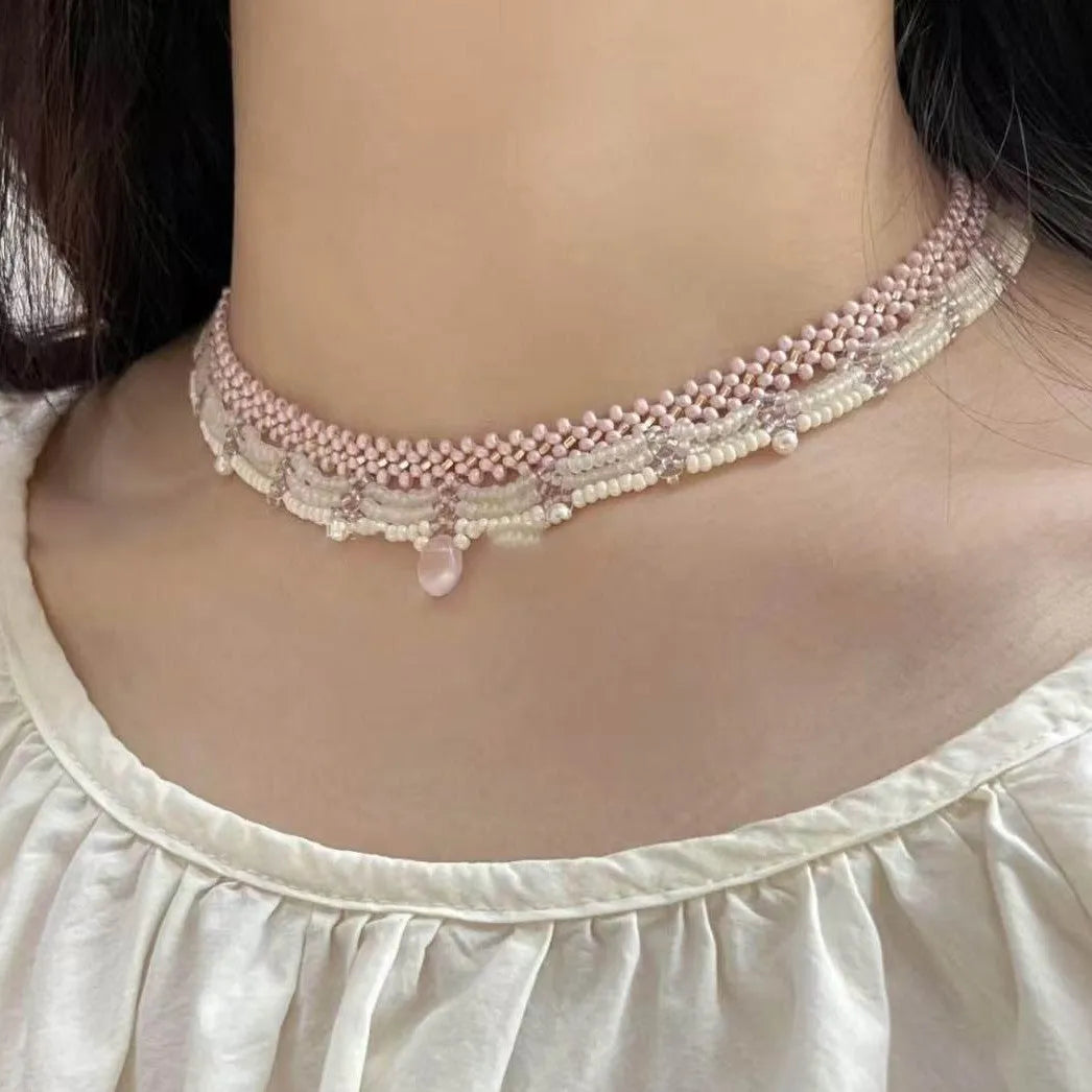 Hand-woven pink glass bead tassel necklace with alloy pendant on regular chain