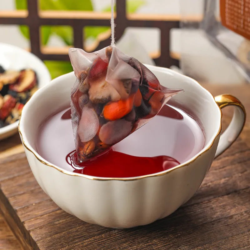Pack of Ginseng Black Wolfberry Tea showing 40 individual 5g sachets for male vitality support.