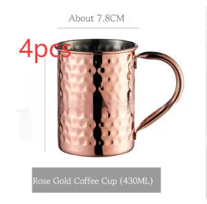 Stainless steel Moscow Mule cup with copper plating in hammer point style showing metallic finish.