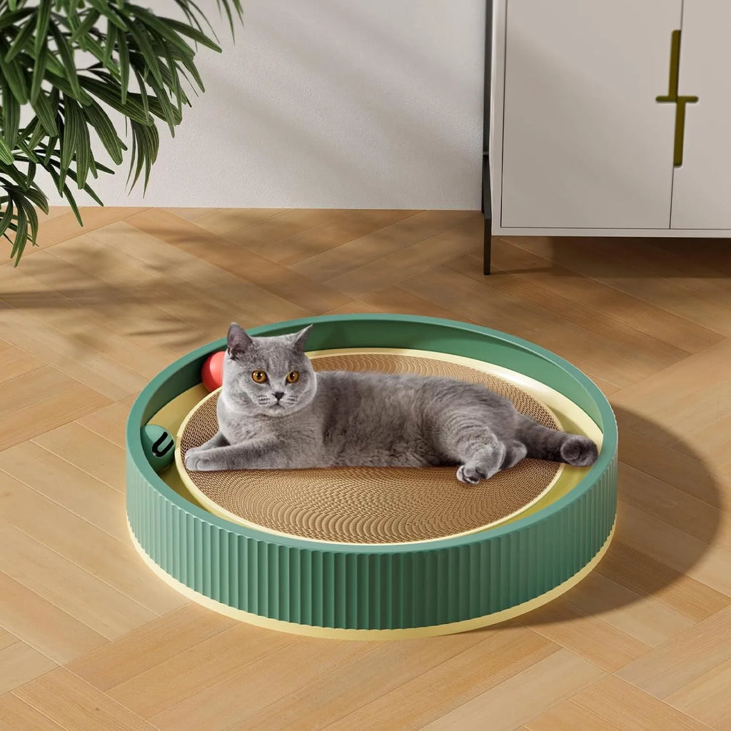 Large green cat scratching board with ball toys measuring 45cm diameter for indoor cats