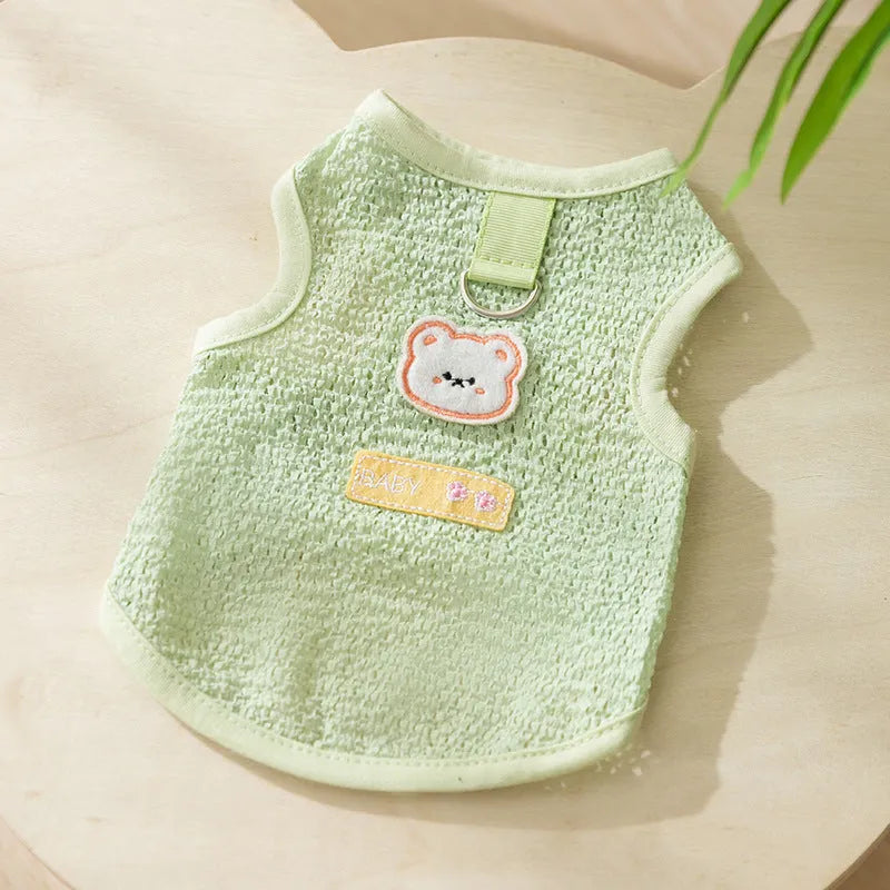 Green knitted cat clothes with bear patch showing hollowed-out breathable design