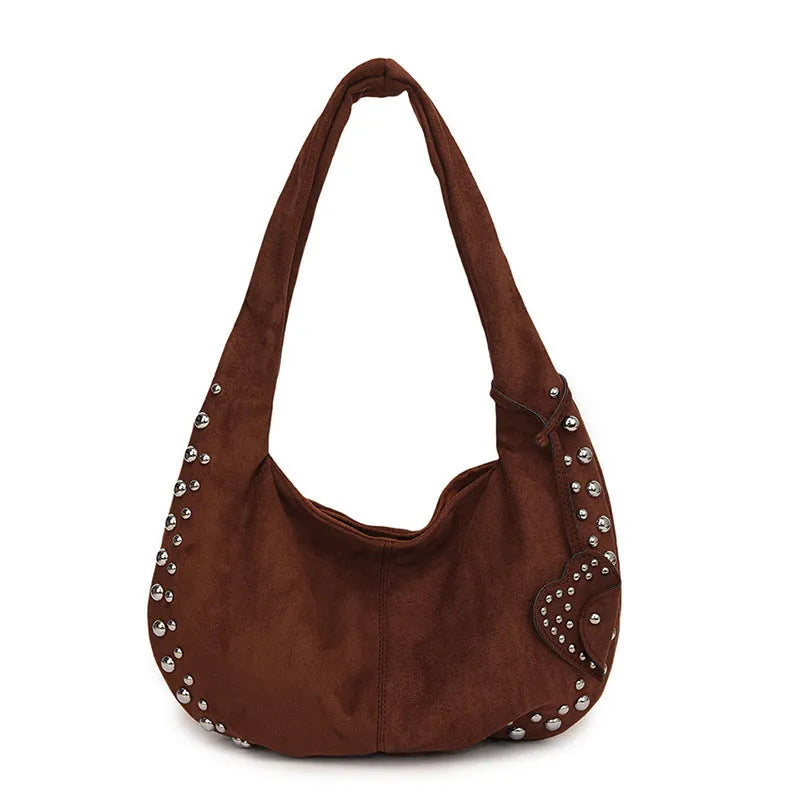 Women's soft plush tote handbag in retro styling with strapless underarm design