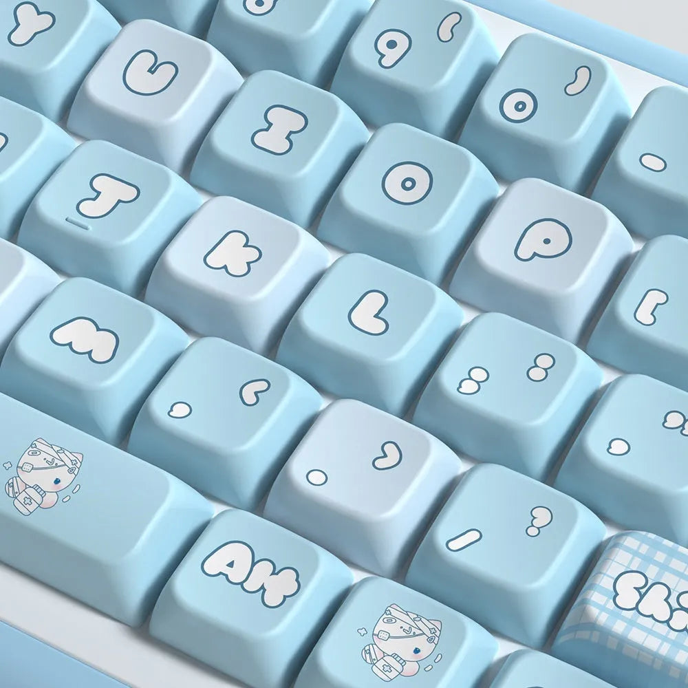 Watercolour kitten illustration custom keycap set for mechanical keyboard, showing multiple PTB keys with opaque legends.