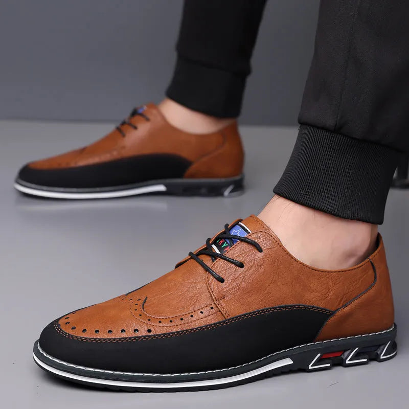 Men's leather slip-on shoes in black, grey, khaki and orange colours with rubber soles and low-top design