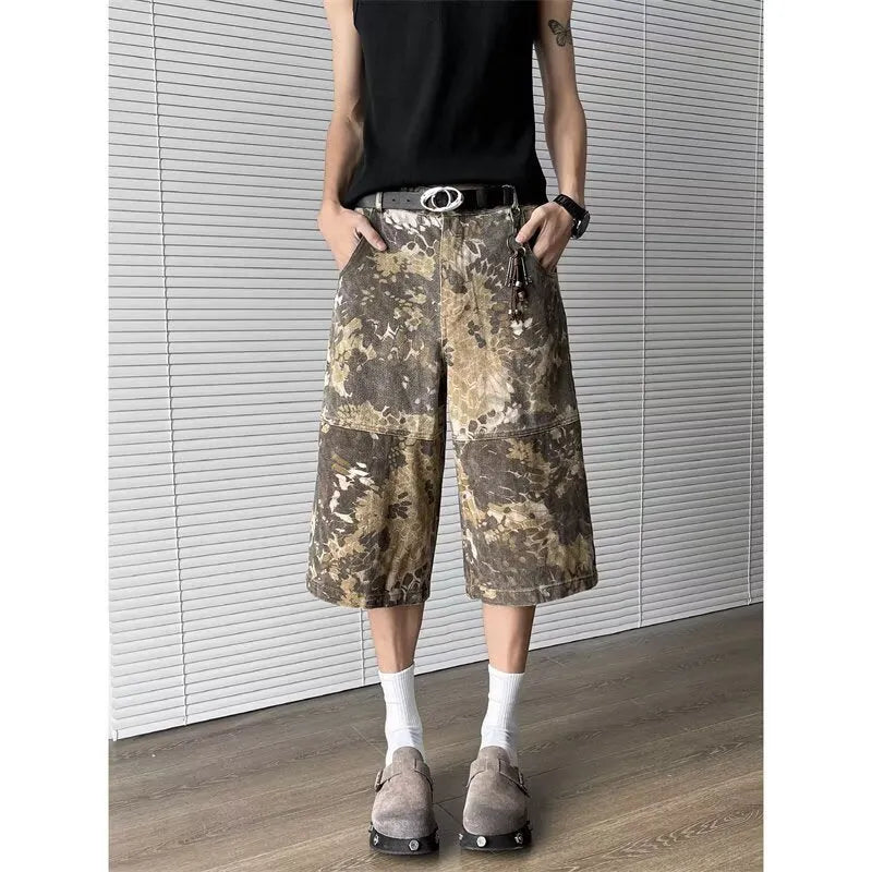 Women's yellow snake camouflage print cropped jeans on a model.