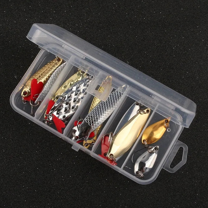 Pineapple sequin box containing metal fishing lure components in gold and silver colours