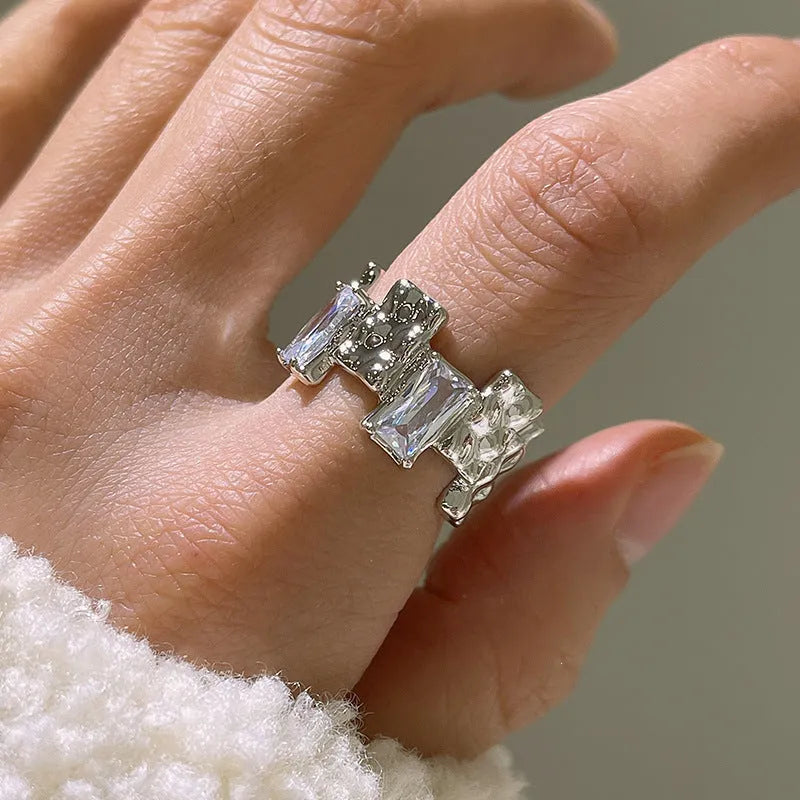 Silver cross zircon ring with open gemstone design and geometric three-dimensional decoration in retro style