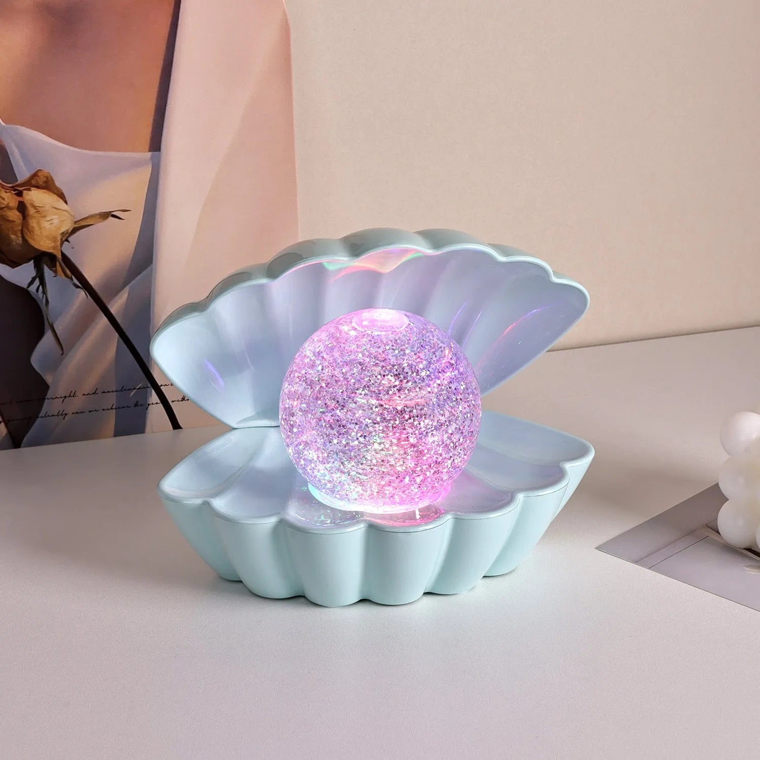 Shell-shaped neon night lamp measuring 15 by 18cm with battery power for cordless decorative lighting