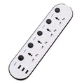 Multi-switch power strip with international sockets, USB ports, and a long cable on a desk.