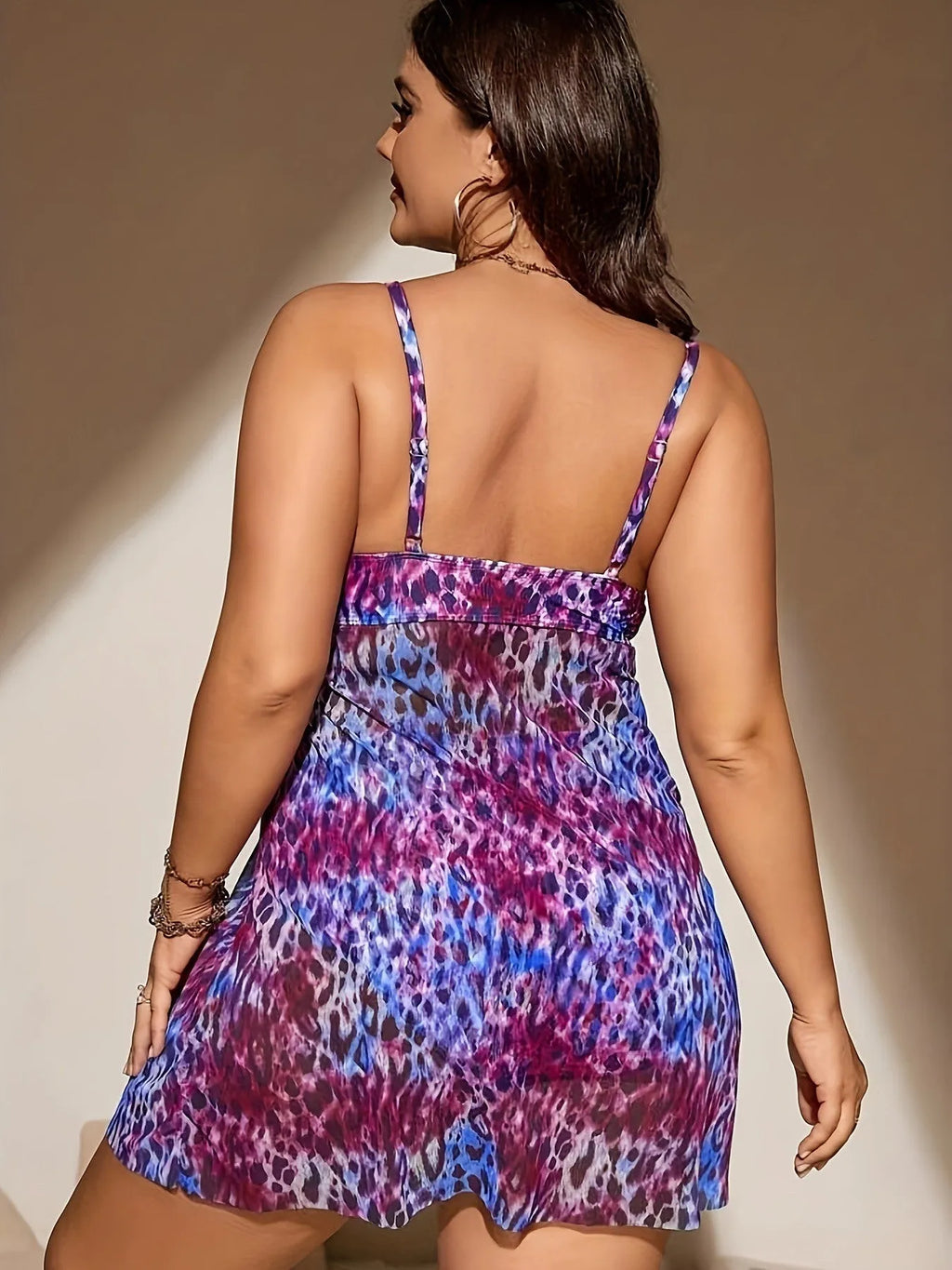 Plus size women's swim bikini with skirt split design in blue, purple, red, or rose red.