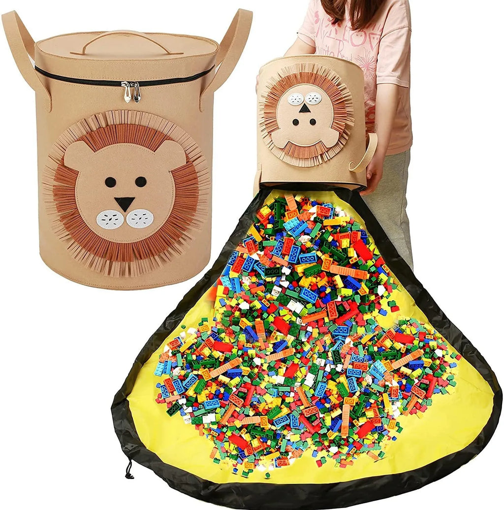 Green felt cube storage bag with a pull rope, laid flat as a play mat.
