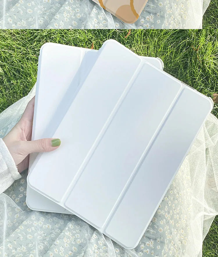 Cartoon style silicone tri-fold protective case for Apple iPad in standing position.