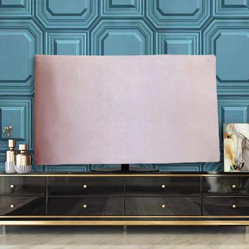 Soft pink velvet dust cover draped over a 55-inch flat screen LCD television.