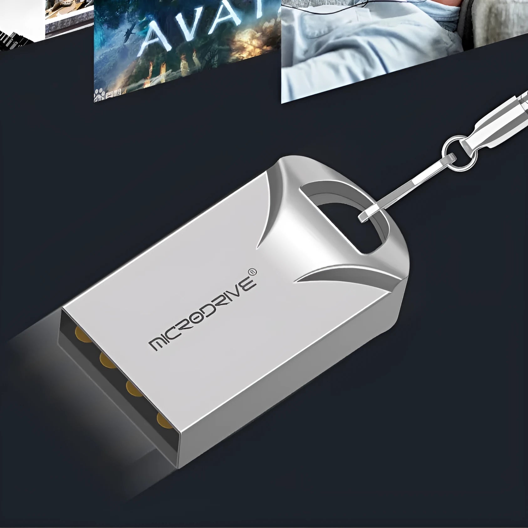 Small black and silver metal USB flash drive showing front and side views
