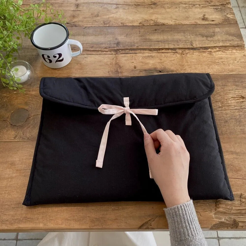 Women's black and white ballet bow quilted laptop computer bag with striped pattern