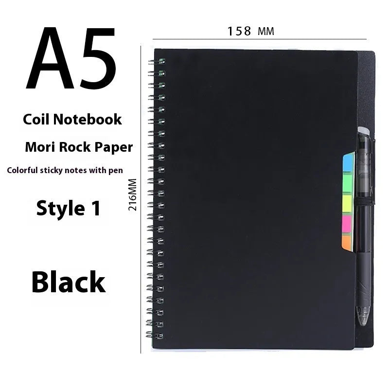 A5 spiral bound reusable notebook with stone paper, shown with pen on customisable coloured cover.