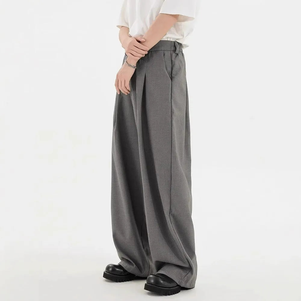Men's straight casual trousers in black, loose fit, front view, polyester blend fabric