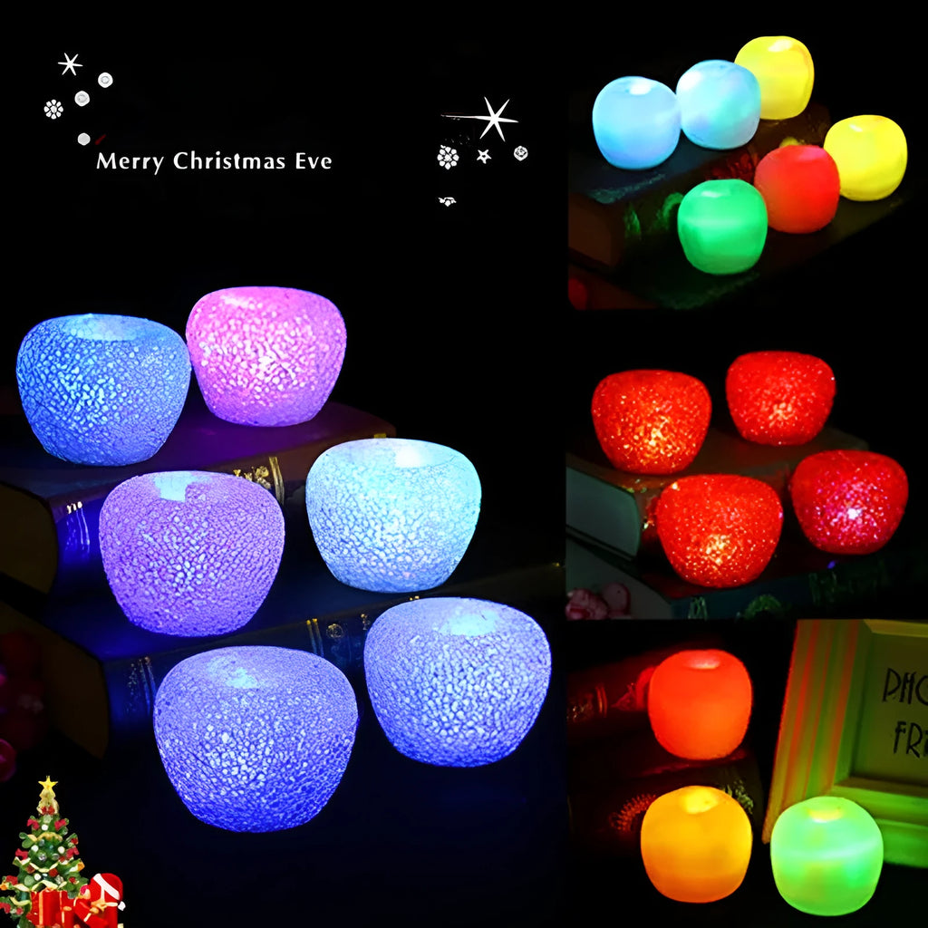 LED lit crystal apple Christmas decoration with warm glow on a shelf