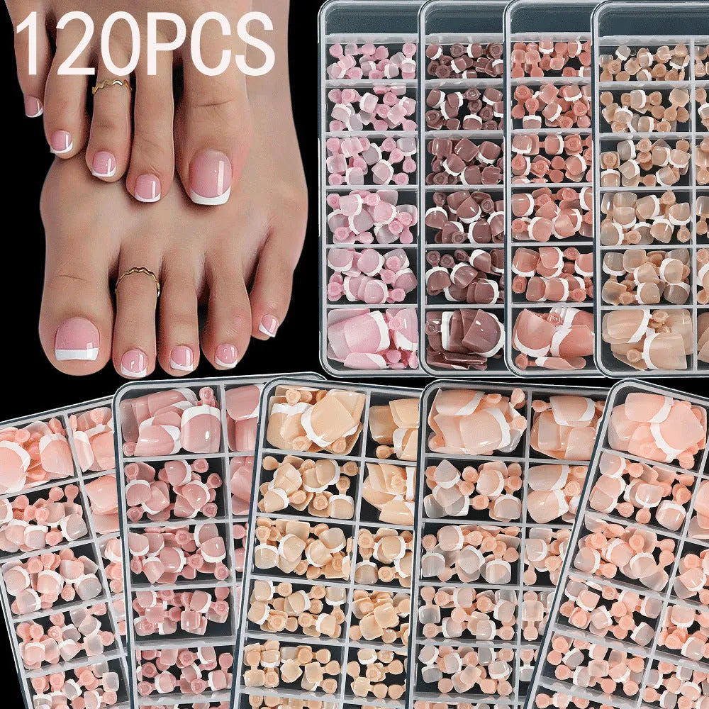 120-piece box of French white tip false toenails in nude colours, square short shape.