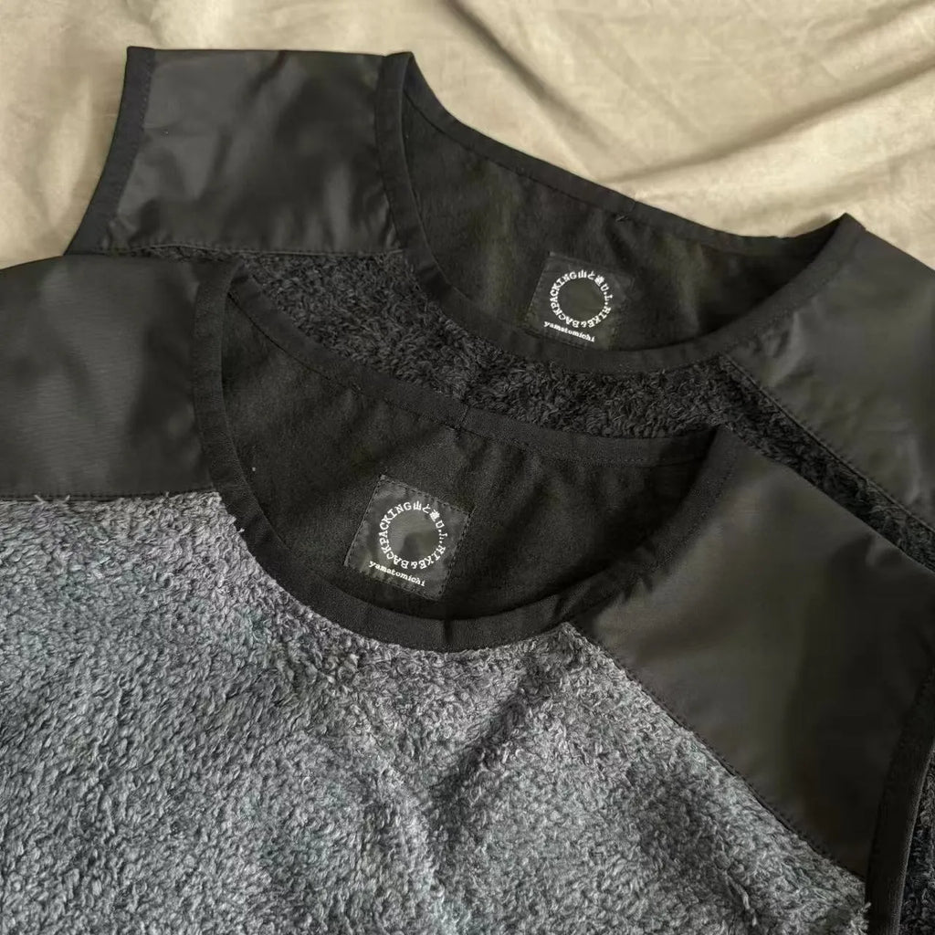 Men's lightweight fleece lined thermal vest in black solid colour with loose fit