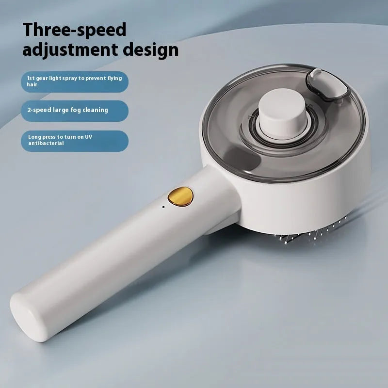 Ceramic white pet grooming brush with UV sterilisation light and spray mist function for dog and cat hair removal