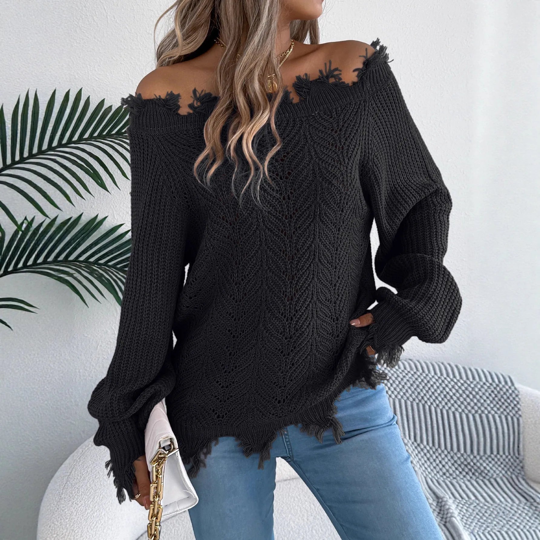 White hollow-out long-sleeved pullover sweater with cut off-the-shoulder design