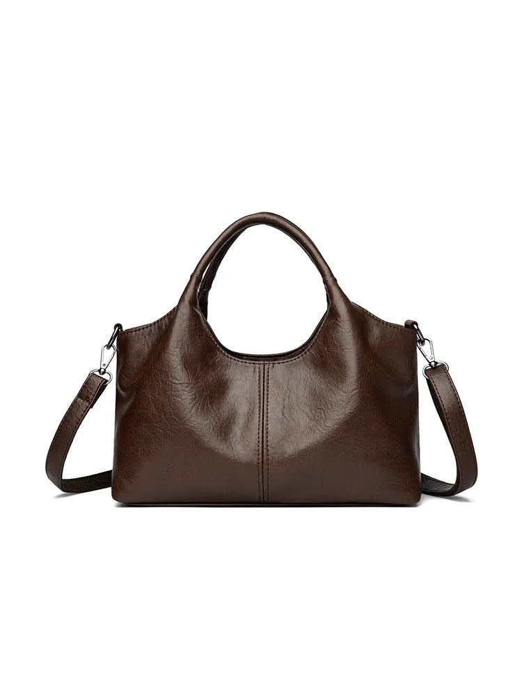 Genuine leather women's cross-body bag in available colours with adjustable shoulder strap