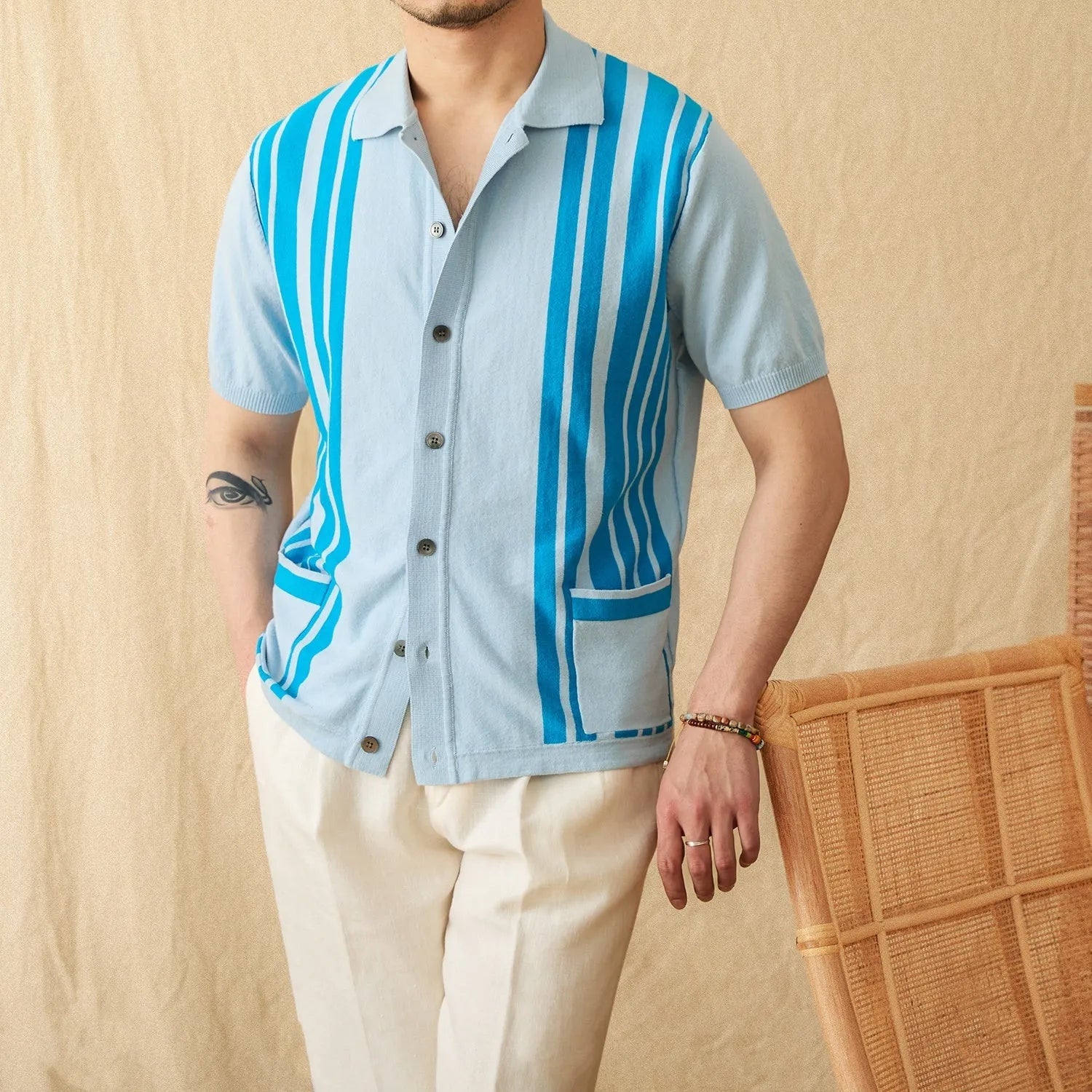 Striped short-sleeve knitted cardigan polo shirt with lapel collar in light blue colour
