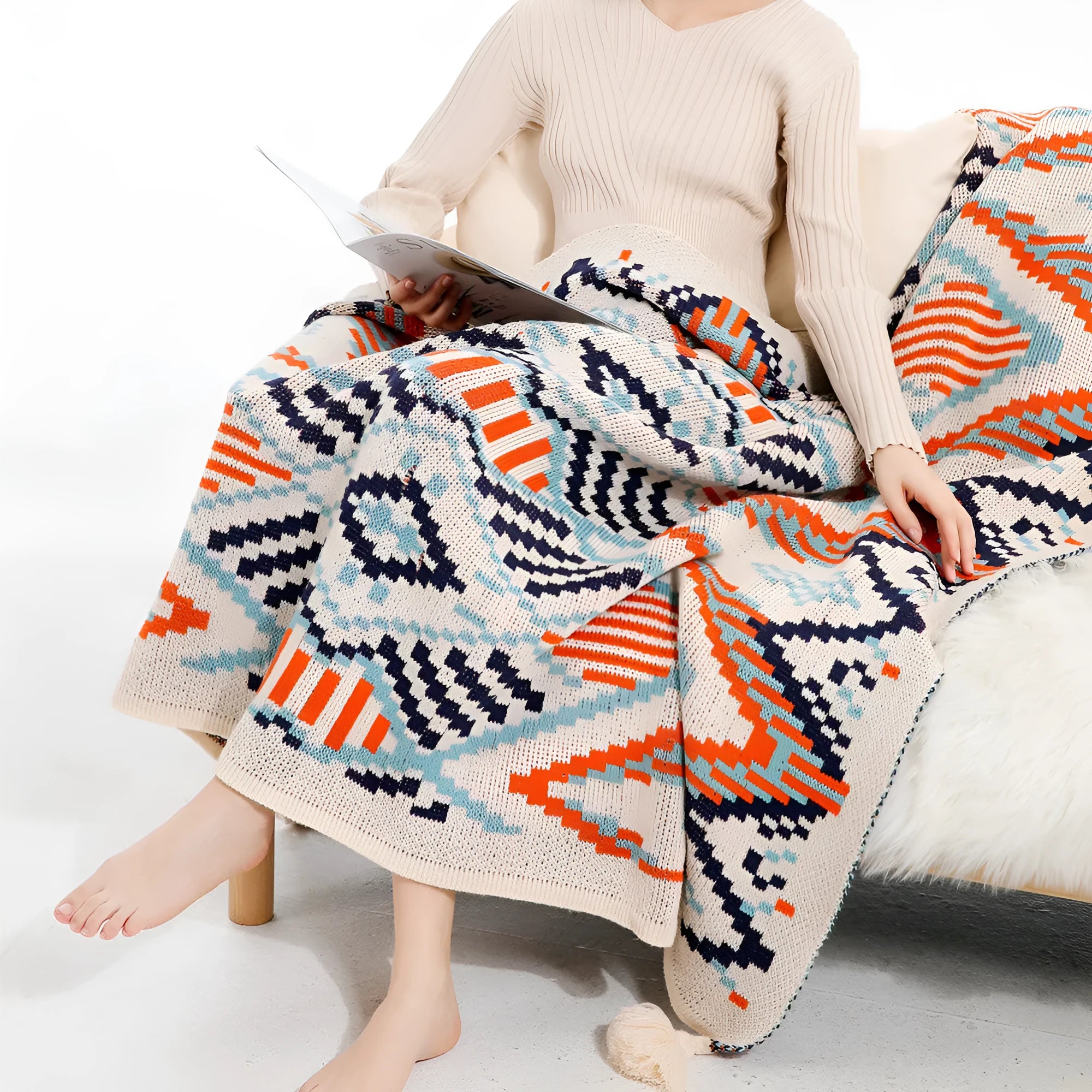 Bohemian-style acrylic sofa blanket with tassel edges in geometric pattern or solid colour options