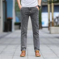 Men's smoky gray jeans with straight leg cut and rabbit fur fabric showing zip fly closure