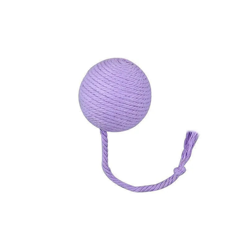 Green and pink soft plush cat toy balls with rope tails and internal bells