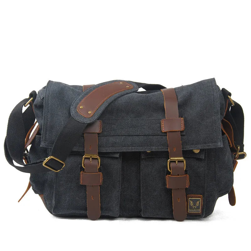 Men's brown retro canvas crossbody shoulder bag with cowhide trim, shown with flap open revealing internal zip pockets.