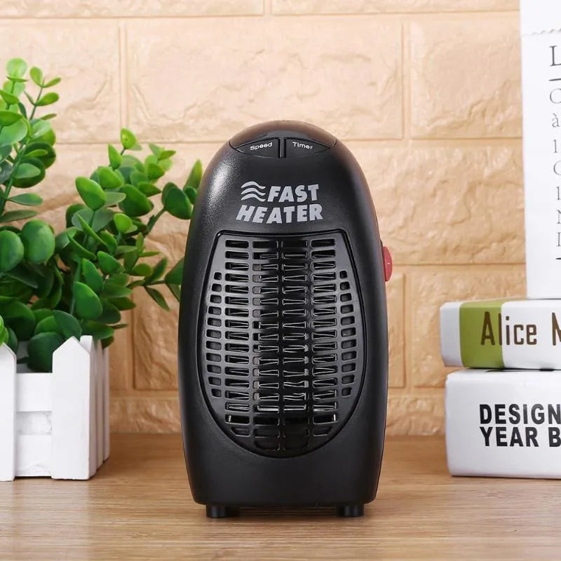 Black compact electric ceramic heater with digital display and rotating plug on desk
