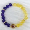 Handmade women's yellow and purple crystal bracelet with amethyst beads