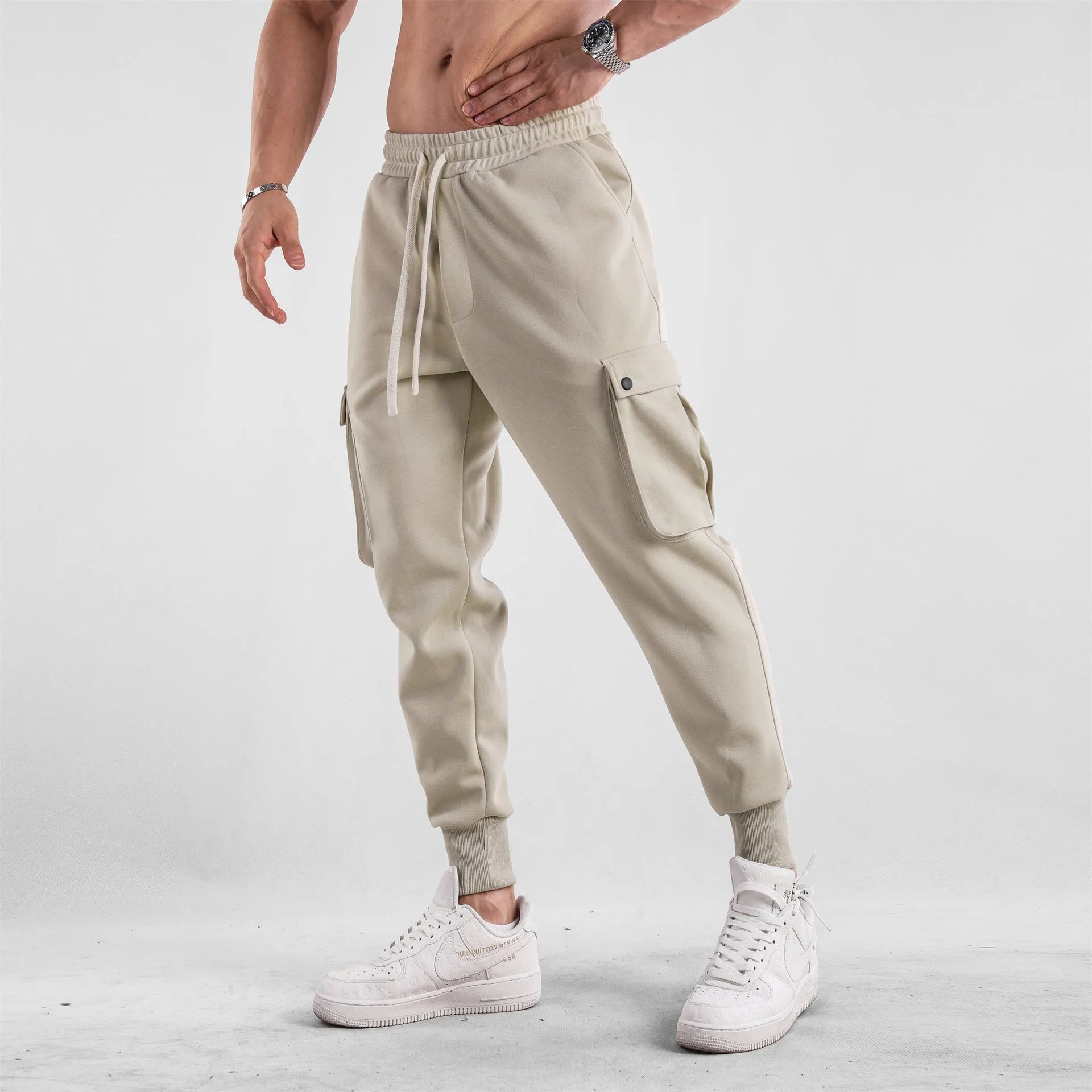 Men's loose cotton trousers with ankle tie fastening and multiple pockets in six colour options