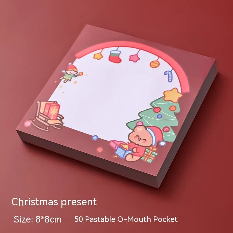 Christmas cartoon sticky notes stationery book with holiday designs including elf, gift, sled and Santa Claus