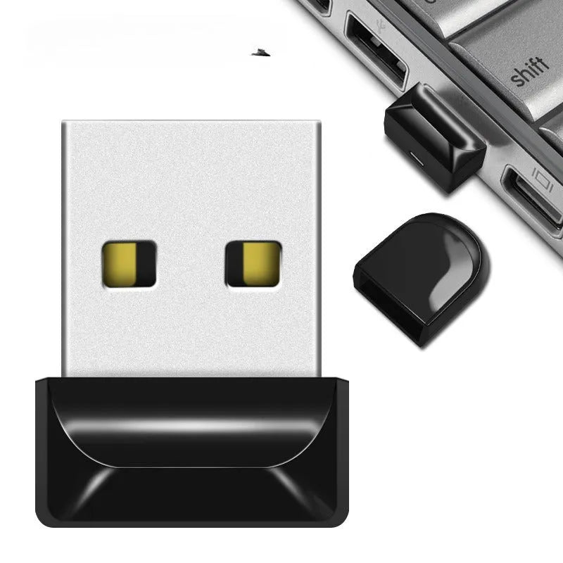 Miniature silver car-shaped metal USB flash drive on a necklace chain.