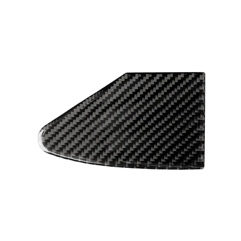 Carbon fibre decorative sticker panel for covering USB and charging ports on electronic devices.