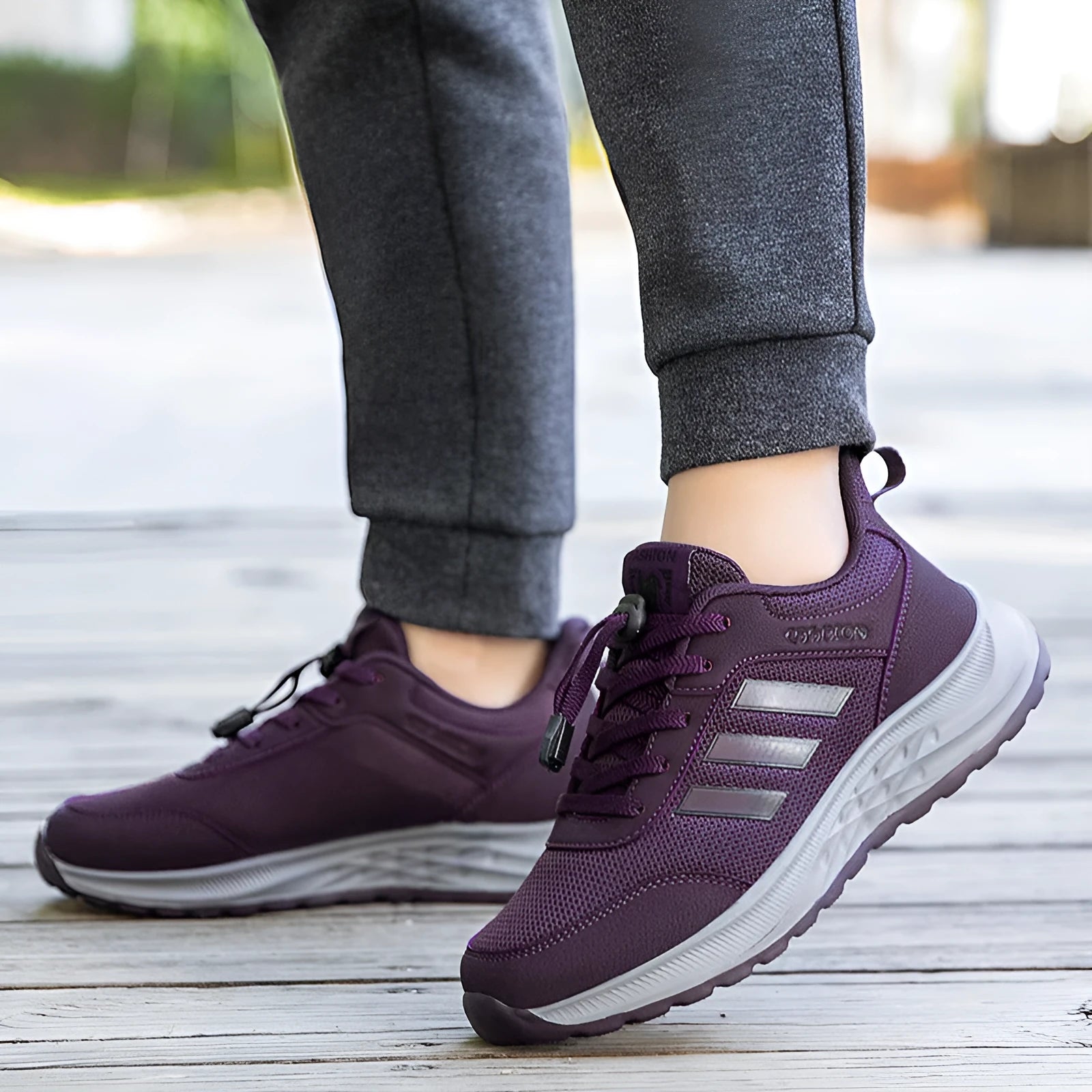 Breathable mesh loafers with elastic band closure in black, dark grey, purple, and purplish red.