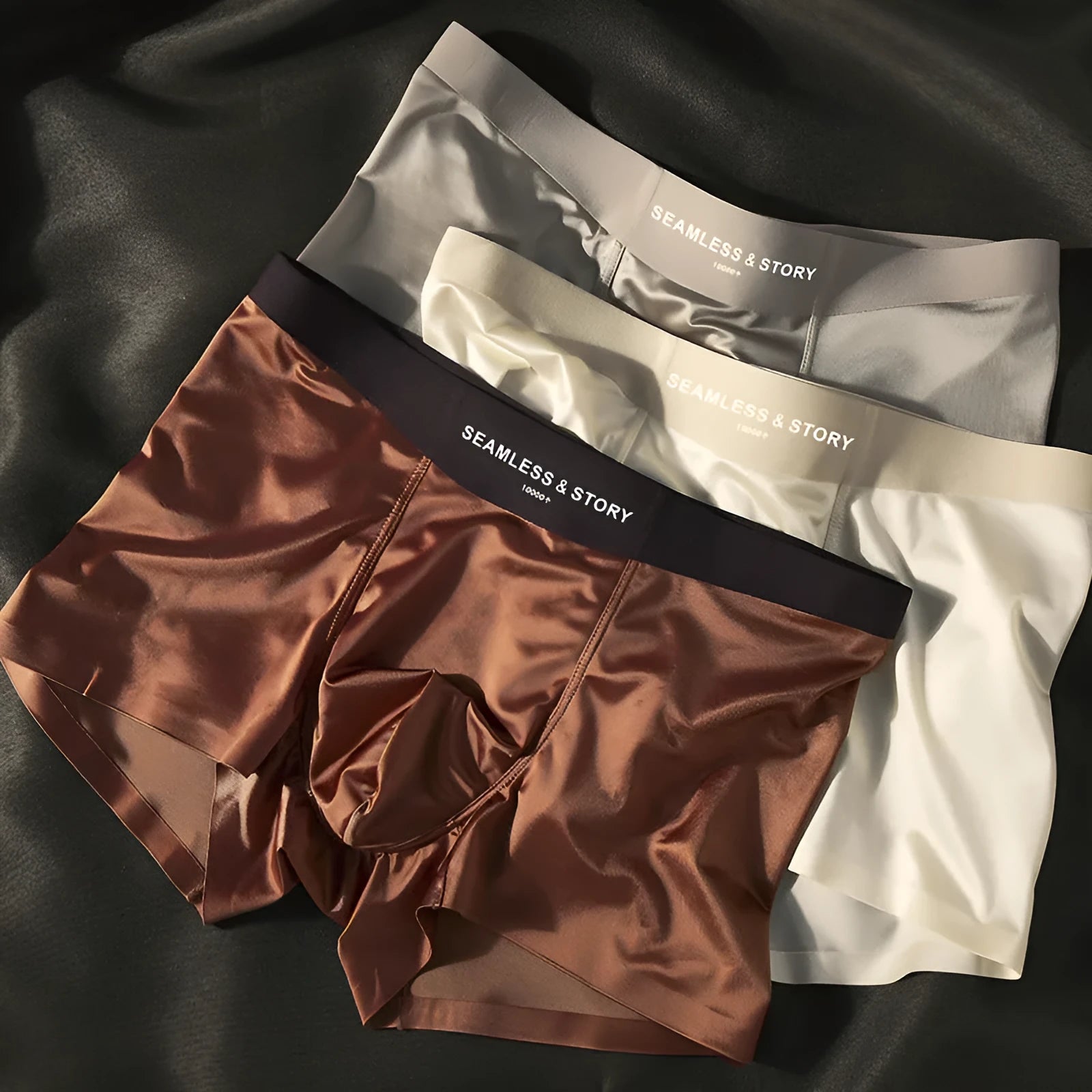 Men's mid-waist ice silk satin underwear in coffee colour showing traceless design