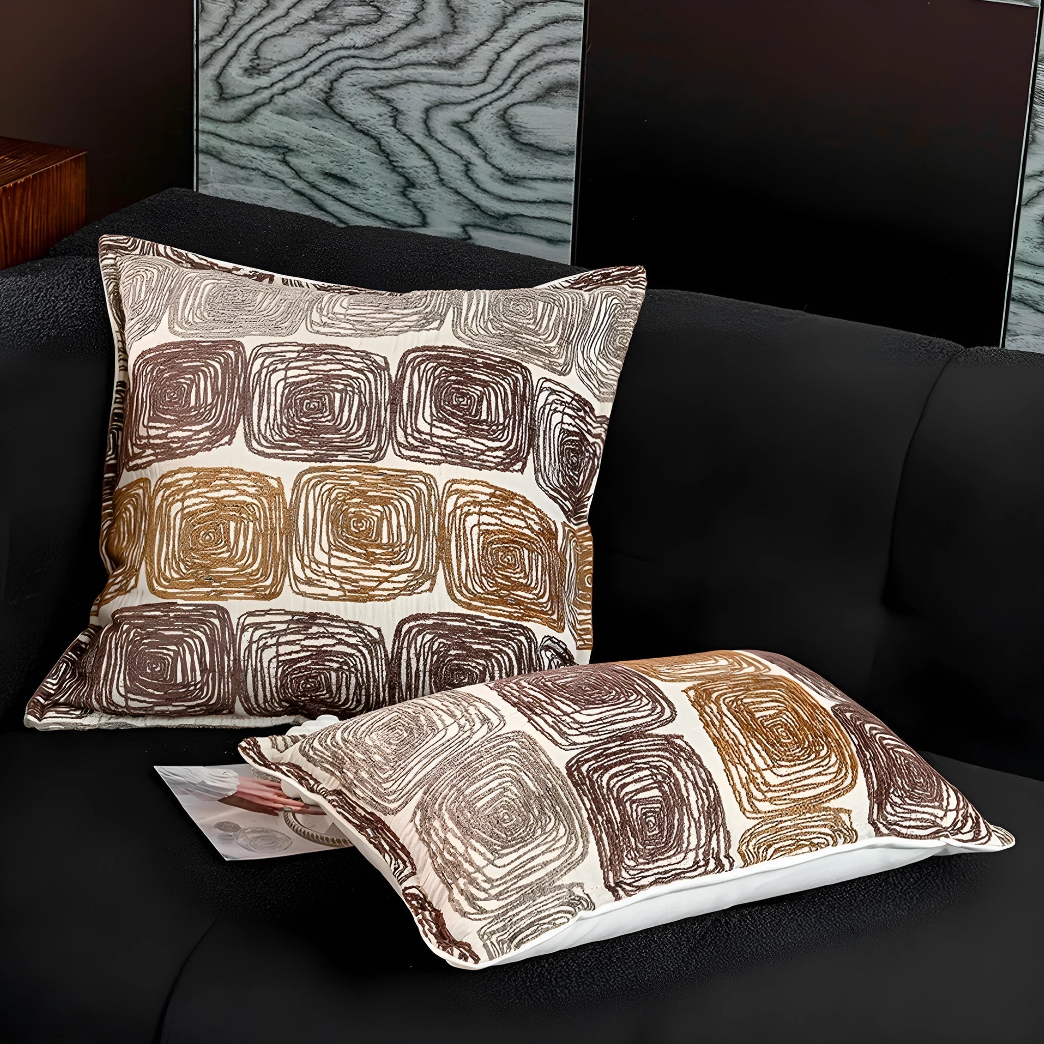 Square cushion cover with abstract coil pattern in cream and coffee colours for sofa decoration