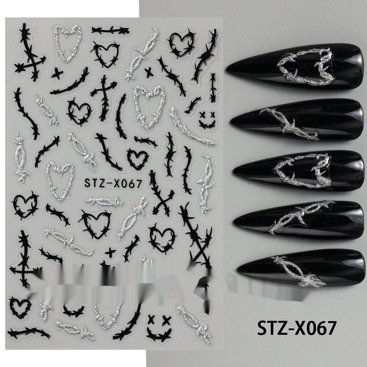 Sheet of black and silver stripe nail art stickers from a cartoon series for DIY manicures.