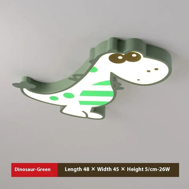 Green cartoon dinosaur ceiling light with dimmer switch on a white ceiling.