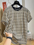 Men's black striped short sleeve shirt in loose silk-linen blend on hanger