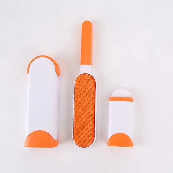 Blue reusable pet hair removal comb with double-sided flannel brush and self-cleaning base for sofas.