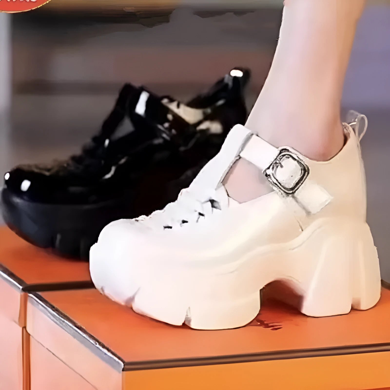 Women's Roman style wedge heel pumps in black with satin upper and closed toe design