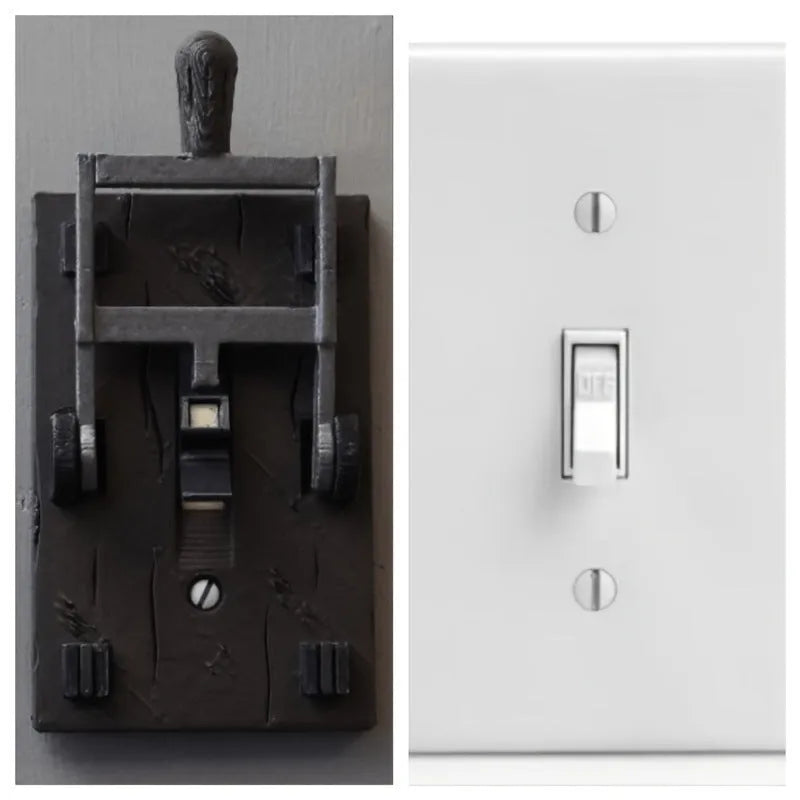 Retro-style mechanical light switch with a decorated plate for exposed wall installation.